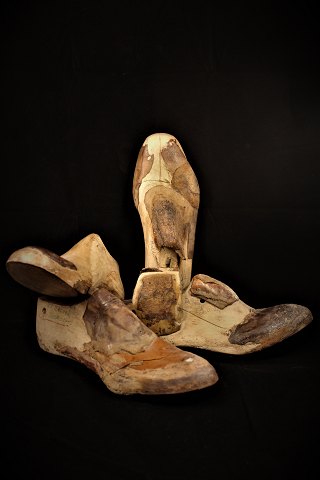 Decorative old French shoe lasts of wood from old shoemaker