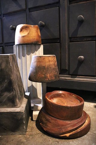 Decorative, old hat forms in carved wood with a fine patina...