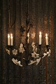 French 1800 century church chandelier ,
decorated with 16 old white opal glass flowers.
H:60cm. dia.:52cm.