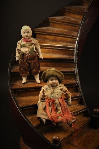 Small decorative antique porcelain dolls with old fabric clothes. Height: 10cm. 
Boy & girl.