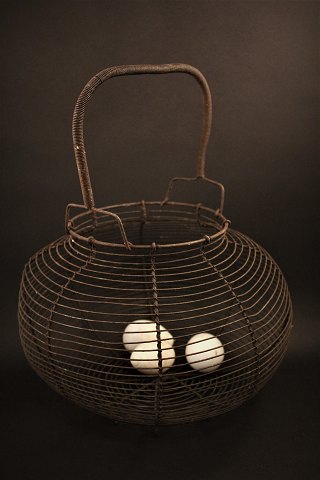 Large old French egg basket in fil de fer with a really fine patina.
H:40cm. Dia.:32cm.