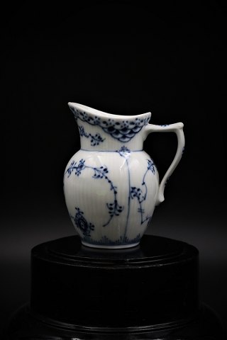 Royal Copenhagen Blue Fluted Half Lace Cream Jug.
RC# 1/522. 1.sort. H:10cm.