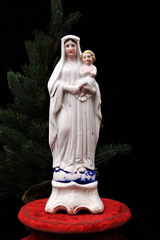 Decorative, old porcelain Madonna figure of the Virgin Mary with the baby 
Jesus...