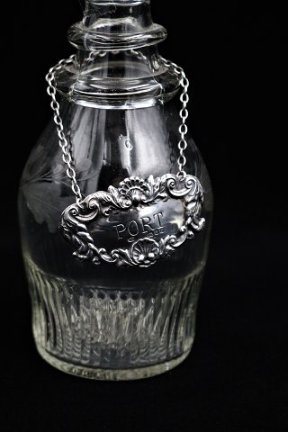 Old spirits sign "Port" in silver...