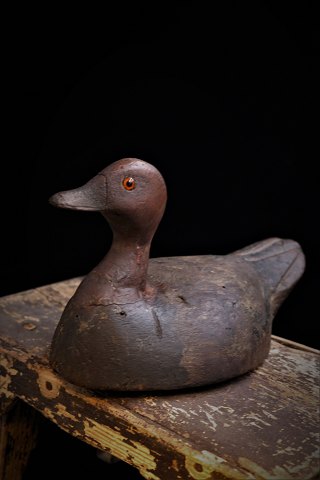 Decorative, old decoy in painted wood with glass eyes and with a fine patina...