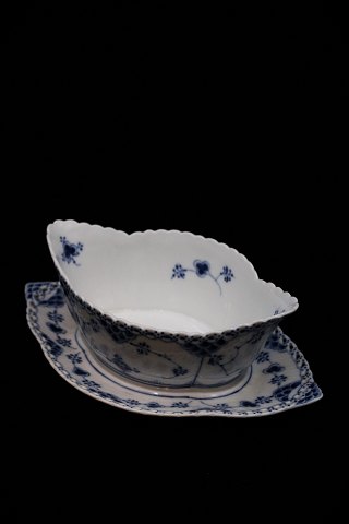 Royal Copenhagen Blue Fluted full lace sauce dish on fixed saucer. 
RC# 1/1105...