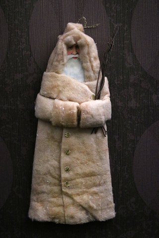 Old Christmas tree ornament made of Santa Claus made of cotton wool, cardboard 
and glossy image...