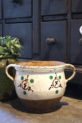 Decorative Swedish 19th century glazed clay jar with handle and a super nice 
patina...