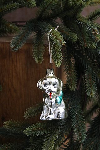 Gammelt juletræspynt i form af lille hund i glas fra omkring 1950.
