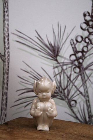 Rare porcelain figure of Faun / Pan from Royal Copenhagen, 
designed by Arno Malinowski...