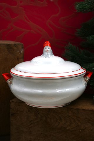 Old Swedish Christmas tureen in faience with a gnome on the top of the lid and 
on the handles...