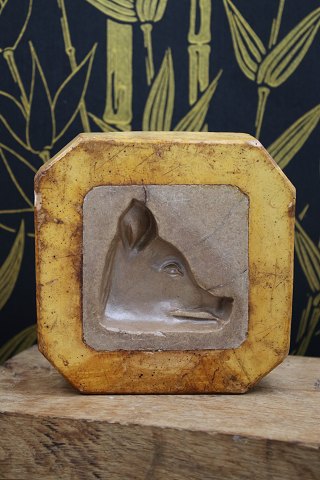 Decorative, old marzipan mold with pig