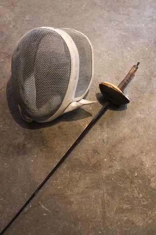 Decorative, old French fencing mask with sword...