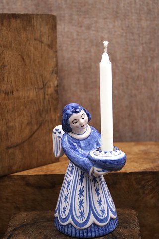 Large ceramic angel with blue glaze holding a small candlefrom L. Hjorth ceramics...