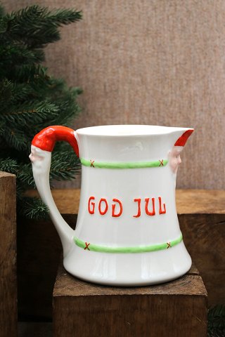Old hand-painted earthenware Christmas jug with "Merry Christmas" and elf faces from Gustafsberg...