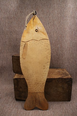 Old, Swedish wooden cutting board in the shape of a fish with a nice old patina...