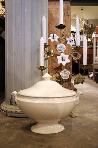 Large, decorative oval French 19th century cream-colored earthenware tureen...