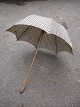 Decorative, old French sun parasol in black / linen colored fabric dating back 
to the beginning of the 1900 century ...