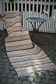 Old Swedish cloth rug in fine colors and good quality. Measures: 235x82cm.