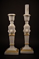 Royal Copenhagen , a pair of lion candlesticks with gold decoration.
Height: 23cm. 
RC# 505.
SOLD !