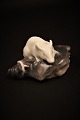 Rare Royal Copenhagen porcelain figurine of little white mouse sitting on top of 
a plaice.
before 1923.