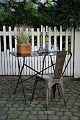 Old French cafe table in completely trimmed iron with super fine patina.
H:75cm. 
L&W:90x47cm.