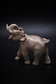 Royal Copenhagen porcelæns figur af lille elefant , design af Knud Kyhn.
H:11cm. L:12cm.
RC# 2998.