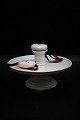 Old cake top in white porcelain with a small extra top in the middle. 
H:14,5 cm. Dia.:26cm.