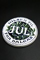 Small round Christmas plate from Aluminia in faience. 
"Greetings for CHRISTMAS from Dalgas" Dia.9 cm. ..