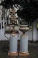 Old Swedish pedestal in wood with Gustavian gray color, gold leaf at the bottom 
and with a fine patina...