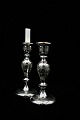 19th century candlestick in Mercury Glass with fine painted leaf tendrils and 
birds. Height: 23.5cm.