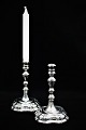 A pair of old Svend Toxværd baroque candlesticks in silver, 
stamped. Sv.T. 925 S. Height: 18cm.