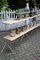 Old French, bookcase consisting of 3 wrought iron floor stands which carry 2 
shelves of old floorboards....