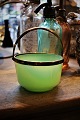 Old candy bowl in green opaline glass with brass handle...