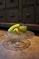 Old layer cake dish in glass on foot...