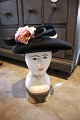 Old French vintage hat from the 40s in black felt with a bouquet of fabric 
flowers.