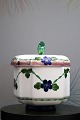 Old Aluminia faience lidded jar with owl on top.