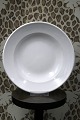Royal Copenhagen dyb tallerken i hvid hotel porcelæn / jern porcelæn.
Dia.: 23,5cm...