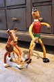 Decorative old wooden doll and dog from the 50s with bendable arms and legs...