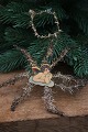 Antique tinsel Christmas tree ornament, cardboard angel with silver tinsel. 
Dia.: 15cm.