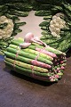 Old, Italian faience lidded jar in the shape of a bunch of asparagus with garlic on top...
