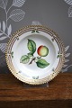 Small deep plate / bowl in Flora Danica set produced by Royal Copenhagen in Denmark...