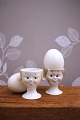 Old egg cups from the 30s in porcelain with painted funny faces...