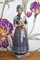 Dahl Jensen porcelain figurine of a Havdrup girl in Danish folk costume with a small dog...