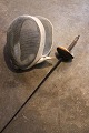 Decorative, old French fencing mask with sword...