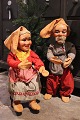 Antique, store display elves with felt clothes and wooden shoes and heads in painted papier-mâché...